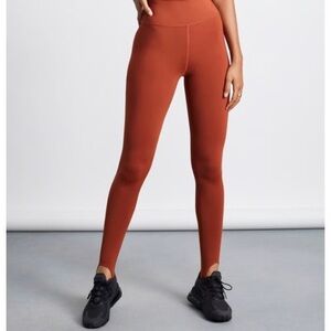 Tropic of C Movement Stirrup Leggings in Dark Orange